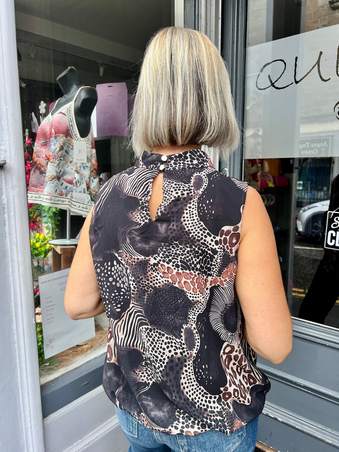 Animal Print Bubble Hem Sleeveless Blouse BLACK