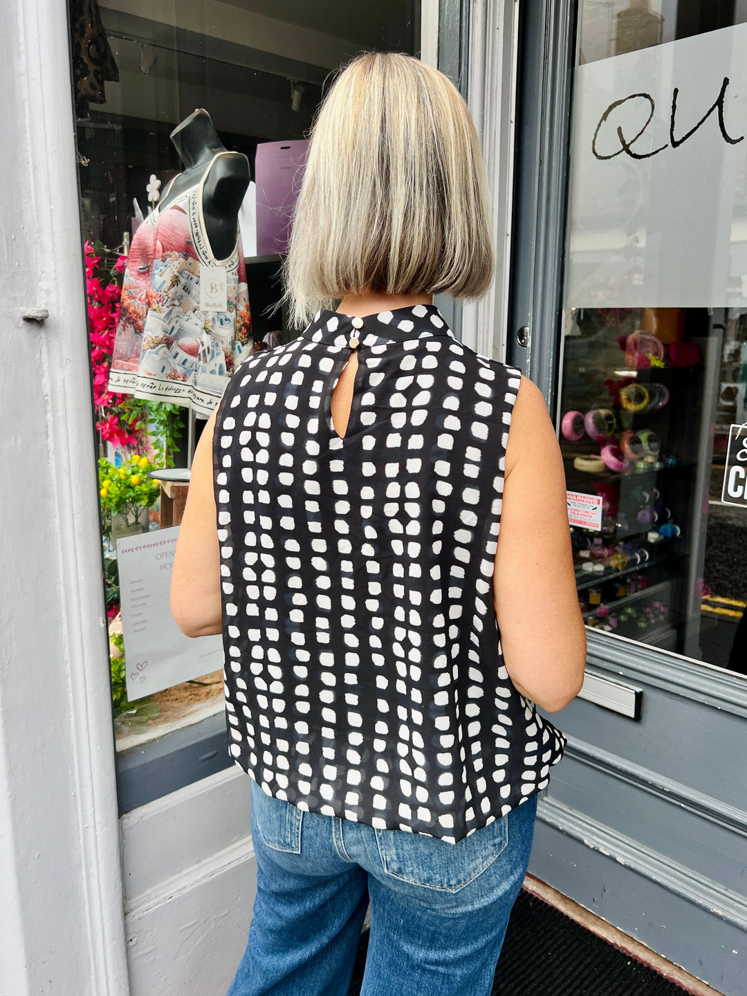Dot Design Bubble Hem Sleeveless Blouse BLACK